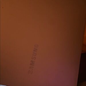 Samsung Silver Laptop with Vibrant Display